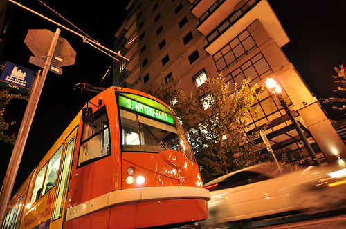 Streetcar in front of tall building in Pearl District